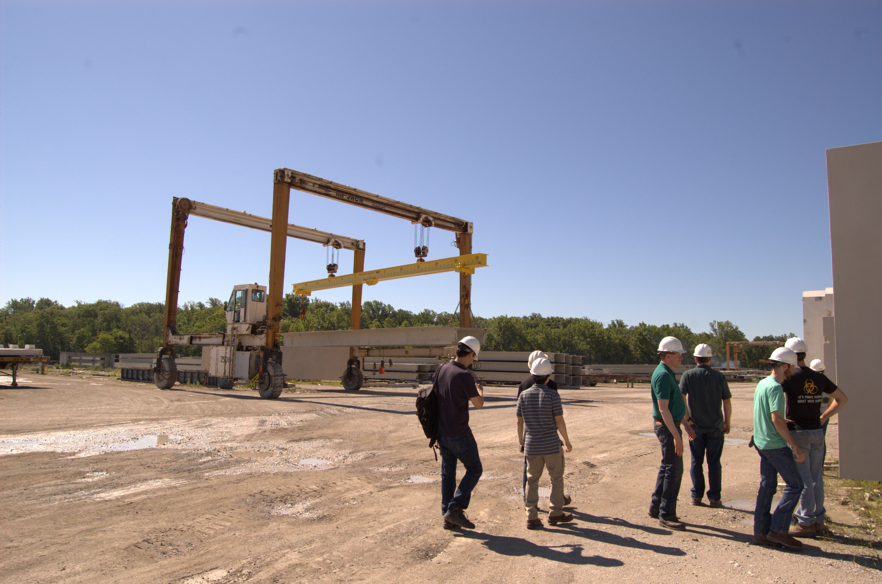 Students examining a structure in the Coreslab facility